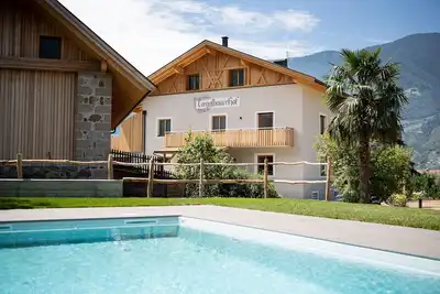 Image de Appartement 'Torgglbauer 1' avec vue sur les montagnes, piscine, terrasse et Wi-Fi