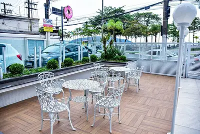 Image de Apto beira-mar c ar-condicionado e boa localização