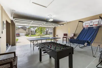 Image de Spacious Lake Conroe Home with Hot Tub, Game Room, Pet-Friendly Yard & Community Amenities!