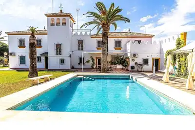 Image de Maison de vacances \"Hacienda El Corchuelo en Marchena\" avec piscine, jardin et Wi-Fi