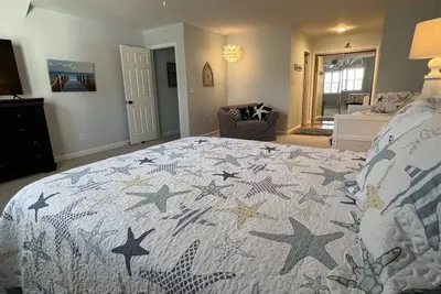 Cute “beachy” condo -2 miles from the beach in quiet neighborhood