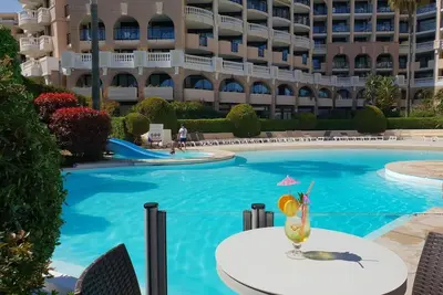 Image de A 50 mètres de la plage, appartement résidentiel avec 2 piscines et 1 restaurant