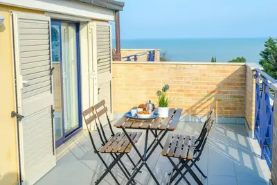 Image de G. Bay C28 - Second floor apartment with balcony and hill view