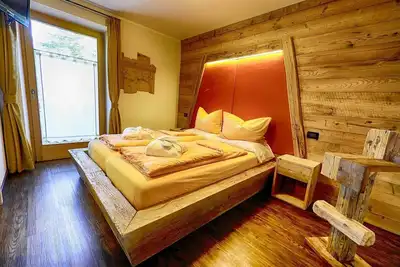 Image de Appartement Mont dala Nef - Baita Cusini avec vue sur les montagnes, spa et Wi-Fi.