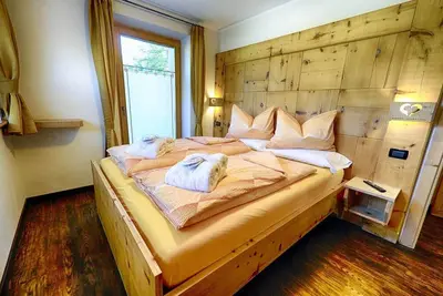 Image de Appartement Li Reza - Baita Cusini avec vue sur les montagnes, espace bien-être et Wi-Fi.