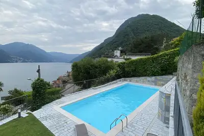 Image de Modern duplex apartment with magic views and pool over the lake.