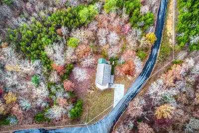 Image de Smokies Mountain Cabin | Hot Tub, Arcade, Firepit, Pets, Deck w/ Views