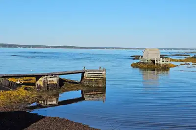 Image de Ocean Front Retreat - Morning coffee watching the BlueNose sail by.