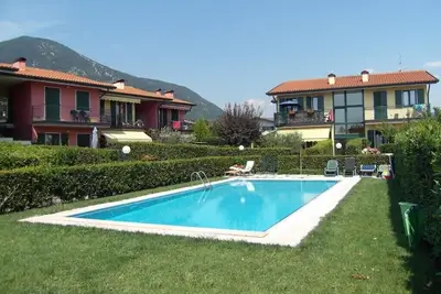 Image de Apartment in residence with swimming pool. Private garden