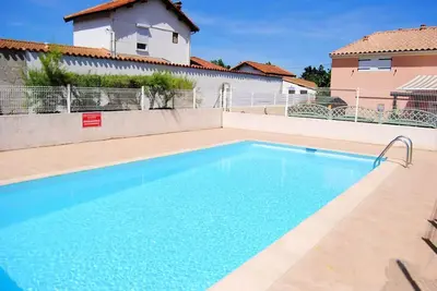 Image de Dans résidence avec piscine proche de la plage