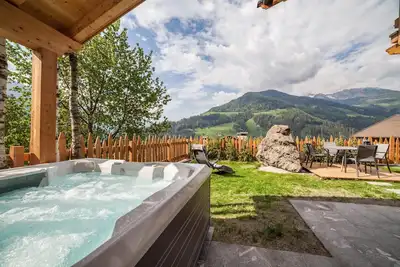 Image de Chalet \"Heidi und Peter\" avec vue sur les montagnes, sauna, bain Ă remous, jardin et Wi-Fi