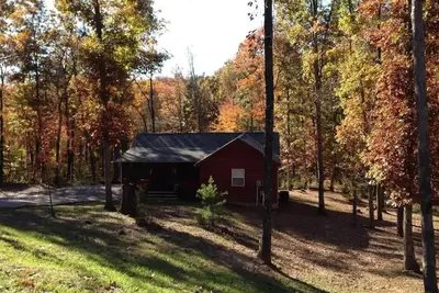 Image de Gas fireplace, firepit, and cedar Adirondack chair