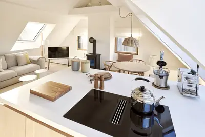 Image de A sense of style, lightness and comfort live here under one roof.