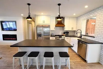 Modern Farmhouse Seconds Away from Granada Park