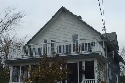 Image de Sunny historic home with water views and large porch