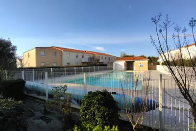 Image de Appartement lumineux avec piscine commune situé à 10 min du remblai