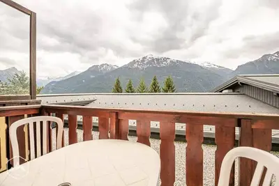 Image de Appartement ambience sur les toits avec vue dégagée sur les montagnes