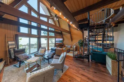 Image de A-Framed Lifestyle Cabin - Where mid-century luxury meets the sky!