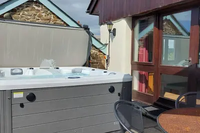 Image de Converted barn with hot tub in north devon