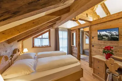 Image de Appartement Piz da Peres - Geiselsberg avec vue sur les montagnes, piscine, sauna, Wi-Fi et jardin