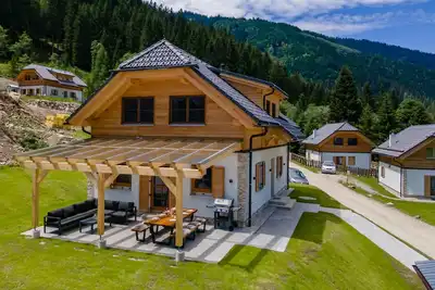 Image de Chalet avec terrasse couverte, sauna et spa