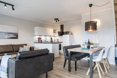 Image de Large apartment in the dreamlike Gulfhof only 3km from the sandy beach of Neßmersiel