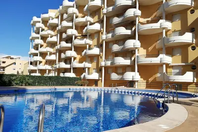 Image de Three bedrooms, two terraces, pool, forty meters from the sand!