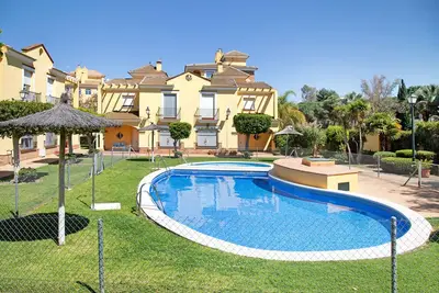 Image de Maison de vacances 'La Casa Del Puerto' avec piscine partagée, Wi-Fi et climatisation