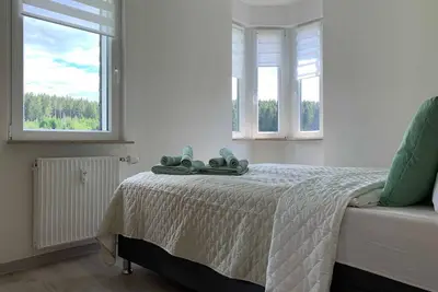Image de Apartment 3 with box-spring bed, 2 single beds and sofa bed - FaFeWo (family vacation apartments)