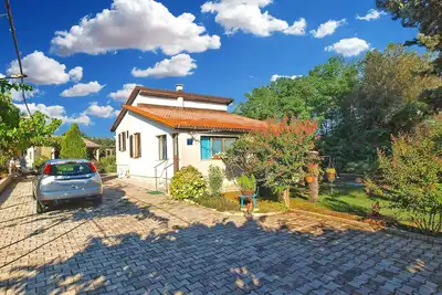 Image de Maison de vacances avec climatisation et terrasse