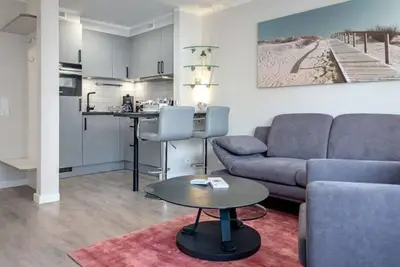Image de Sundowner - Modern 2-room apartment with parking space on the beach