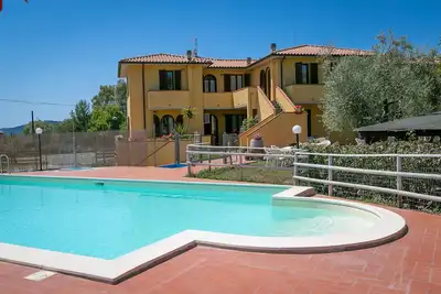 Image de Appartement 'Bilocale Ansonica' avec balcon, piscine partagée et Wi-Fi