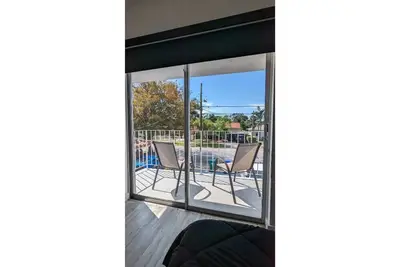 Modern Home w/ Big TVs, King Beds, Patios, Workspace