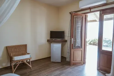 Image de Villas Badiene : Chambre accès direct plage piscine
