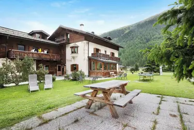 Image de Appartement \"Castagno Chalet Cambra\" avec vue sur les montagnes, Wi-Fi, terrasse et jardin