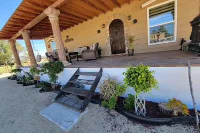 Image de Classic and  comfort cabin within trees, vine and olive trees