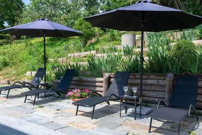 Image de Appartement dans une maison de vacances avec piscine privée, Tv, terrasse, vue panoramique, parking