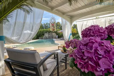 Image de ClickSardegna Maison du Bonheur' Maison avec piscine à effet de plage