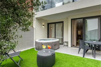 Image de Appartement 0 / Jardin Et Spa PRIVÉ
