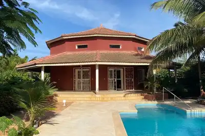 Image de Villa Tout Confort, Typique, type sénégalaise, Grand Jardin 10 min Plage, Calme