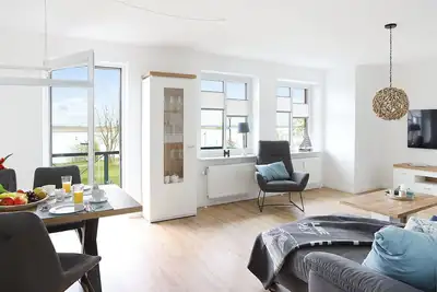 Image de New 5-star vacation apartment with a fantastic view of the Eider.