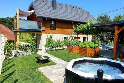 Image de Maison de vacances avec climatisation et jacuzzi