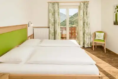Image de Appartement de vacances 'Rasnerhof Ferienwohnung Meran' avec vue sur la montagne, balcon et Wi-Fi