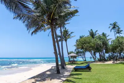 Image de 3 bedroom luxury villa on the beach- Exclusive. Fully Staffed. South Point Villa