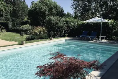 Image de Maison de caractère 180 m2 avec piscine équipée rideau immergé