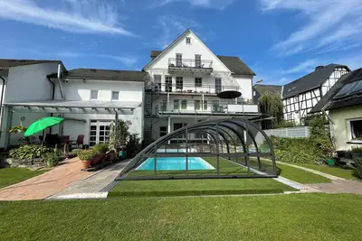 Image de Pino24 Comfort vacation apartment 127 m² with pool, central, for up to12 people