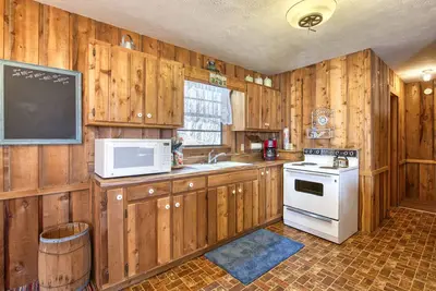 Secluded, rustic mountain cabin with great view, porch swings, & firepit