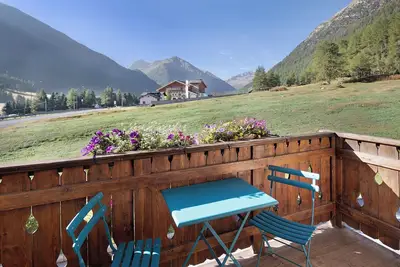 Image de Appartement \"Sole Chalet Martina\" avec vue sur les montagnes, jardin et Wi-Fi.