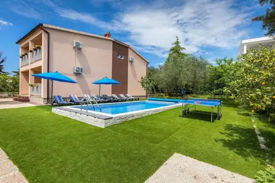 Image de Maison confortable de 4 chambres à.