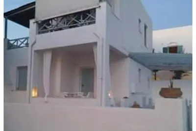 Image de Maison Irini Ă Kini\nDirectement sur la plage de sable! ! \nSuper coucher du soleil!